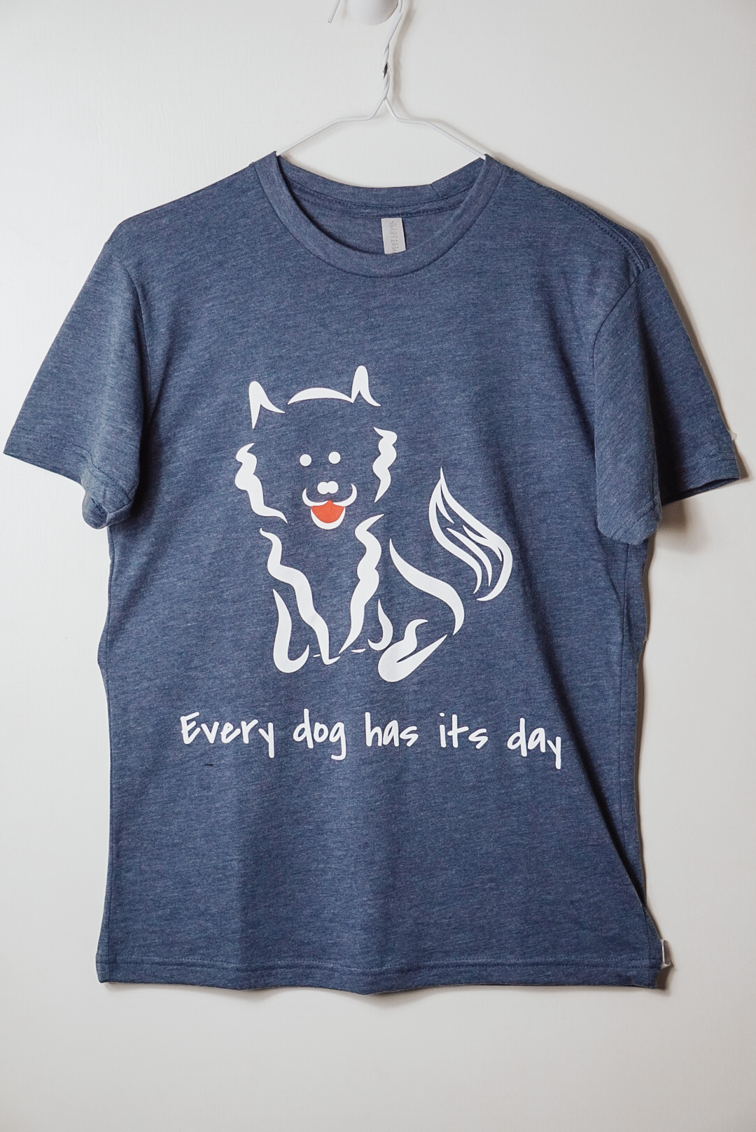 4.2 oz Triblend Unisex Next Level Indigo T-shirt with screen-printed Every Dog Has its Day self-designed Pomeranian graphic